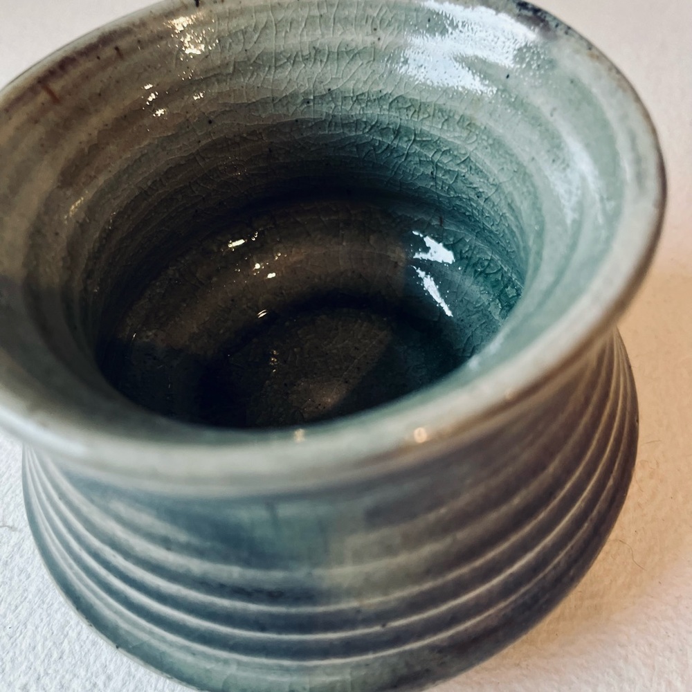 Minimalist Celadon Cup w/ Red and Black Blushings from Carbon Trapping